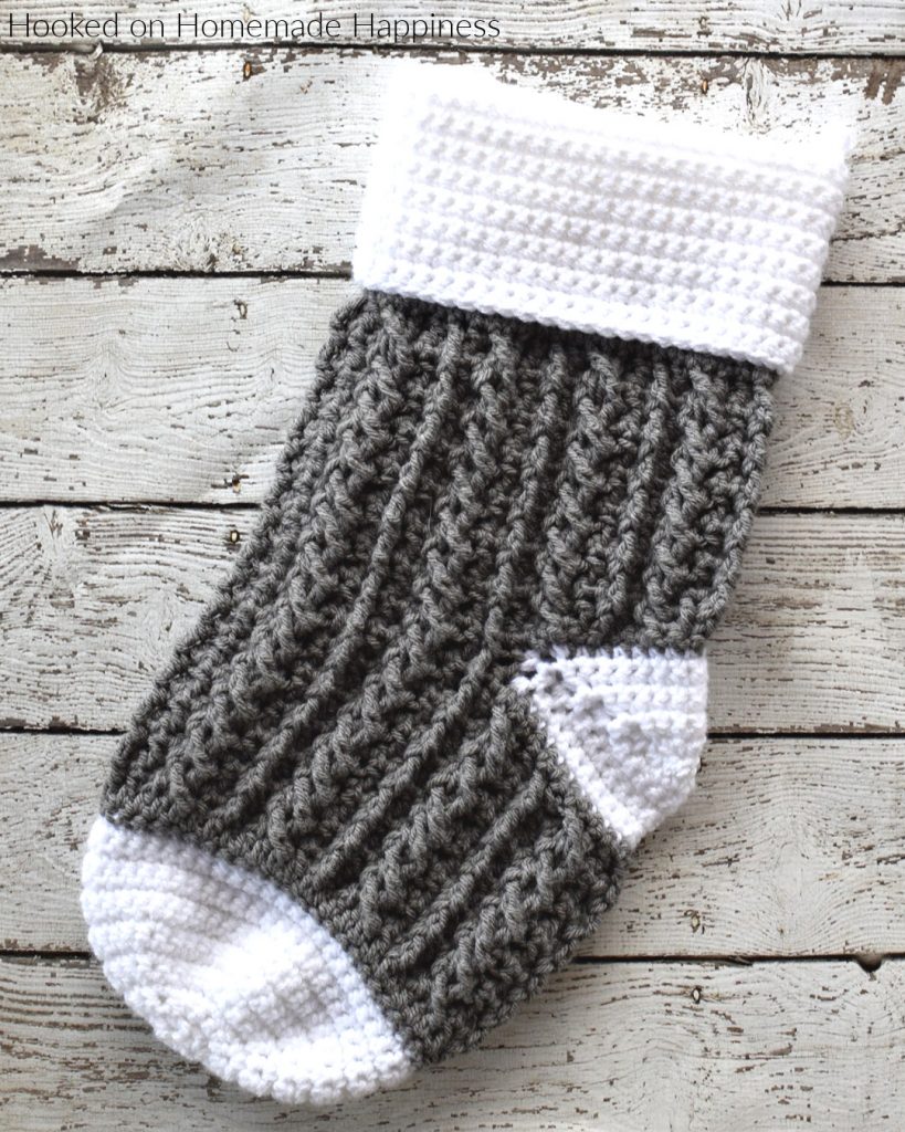 Cable Crochet Stocking Pattern - This Cable Crochet Stocking Pattern is so festive and cute! Because of the bulky weight yarn, it works up surprisingly fast.