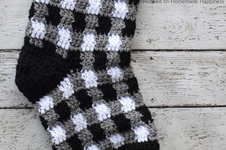 Plaid Crochet Stocking Pattern - This Plaid Crochet Stocking Pattern is so festive and cute! Because of the bulky weight yarn, it works up surprisingly fast. This stocking is a good size and can hold LOTS of goodies from Santa!