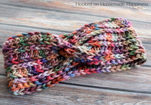 Slightly Twisted Ear Warmer Crochet Pattern - The Slightly Twisted Ear Warmer Crochet Pattern only looks like it's twisted. It's all in the sewing! If you know how to crochet a rectangle, you can definitely make this ear warmer.