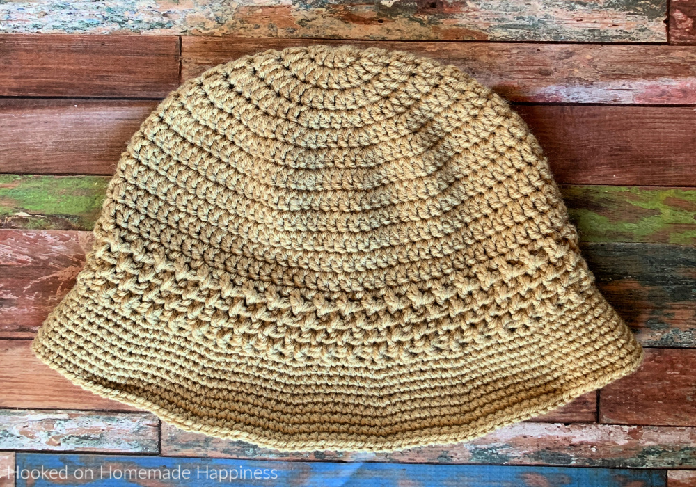 Basketweave Brim Bucket Hat Crochet Pattern - The Basketweave Bucket Hat Crochet Pattern starts as a basic double crochet beanie with a cute textured brim - perfect for summer!