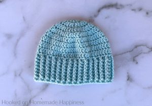 Wide Brim Baby Beanie Crochet Pattern - The Wide Brim Baby Hat Crochet Pattern is a super quick & easy pattern. The stretchy ribbing will be nice and cozy around a little one's ears!