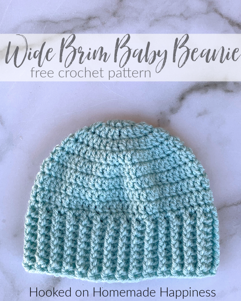 Wide Brim Baby Beanie Crochet Pattern - The Wide Brim Baby Hat Crochet Pattern is a super quick & easy pattern. The stretchy ribbing will be nice and cozy around a little one's ears!
