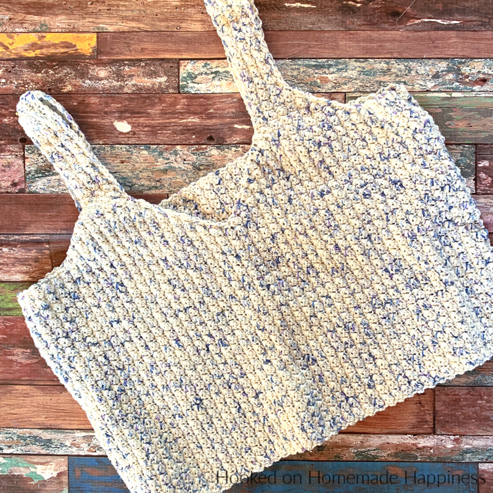 Crop Tank Top Crochet Pattern - The Crop Tank Top Crochet Pattern is made as one entire piece with very little sewing! Making (almost) no sew garments is my new favorite thing and this one fits right in.
