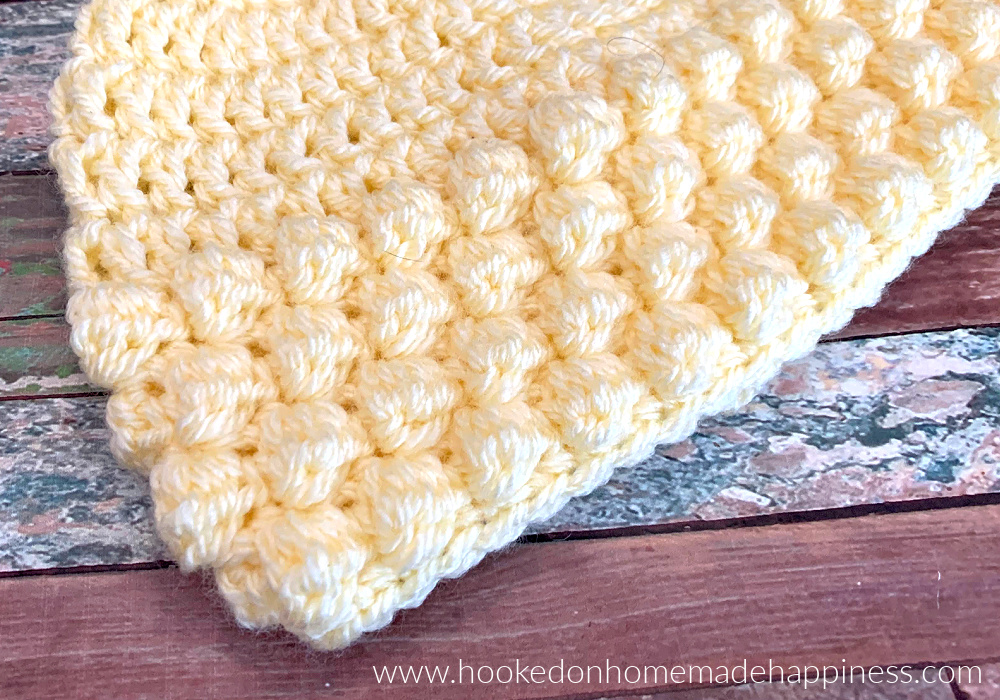 Baby Bobble Beanie Crochet Pattern - The Baby Bobble Beanie Crochet Pattern has such a cute bobble texture! It's an easy and quick hat. Perfect for a last minute gift or donation!