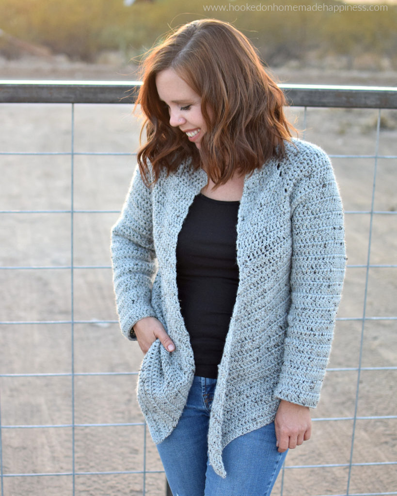 Easy All DC Cardi Crochet Pattern -The Easy All DC Cardi Crochet Pattern is just that! Easy & all double crochet! There isn't any sewing, cuffs, or collars. Just a simple, no fuss sweater using a basic, beginner stitch.