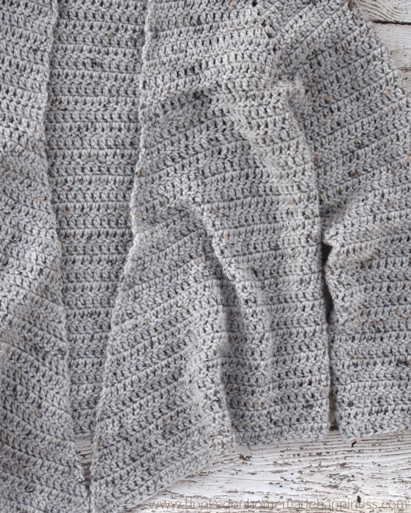 Easy All DC Cardi Crochet Pattern -The Easy All DC Cardi Crochet Pattern is just that! Easy & all double crochet! There isn't any sewing, cuffs, or collars. Just a simple, no fuss sweater using a basic, beginner stitch.
