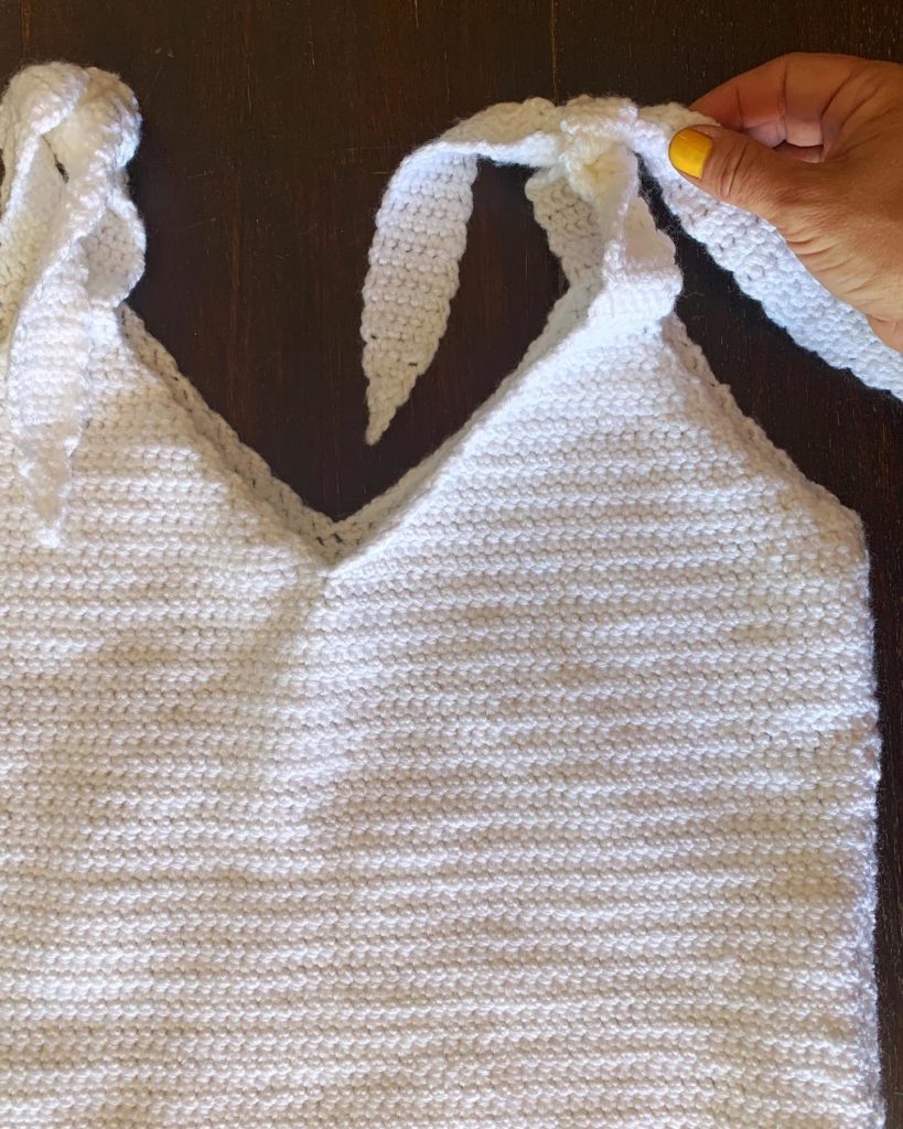 Better than Basic Tank Top Crochet Pattern - The Better Than Basic Tank Top Crochet Pattern is such a simple tank top pattern. It can easily be dressed up or down and can easily be adjusted. Sport weight yarn is used which makes it lightweight and perfect for summer.