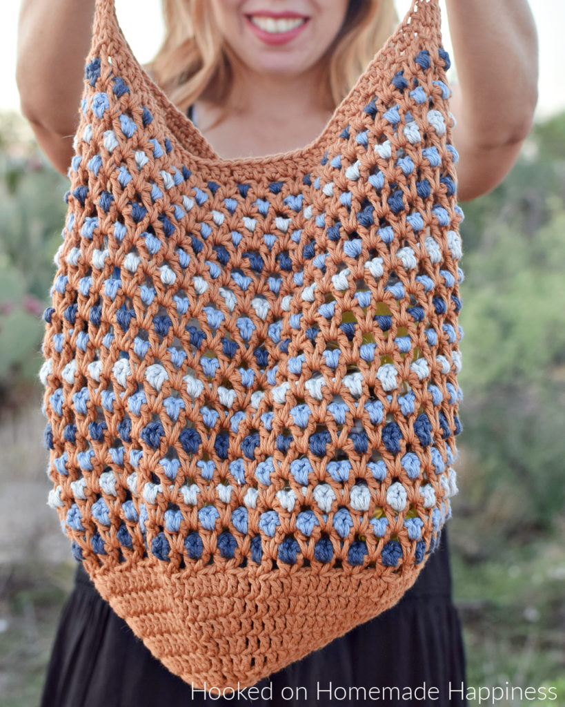 Morocco Market Bag Crochet Pattern - The Morocco Bag Crochet Pattern has such a fun design that's created with a simple V stitch! The stitching looked complicated, but if you know how to double crochet then you can make this bag. It's all about the stitch placement with this texture!