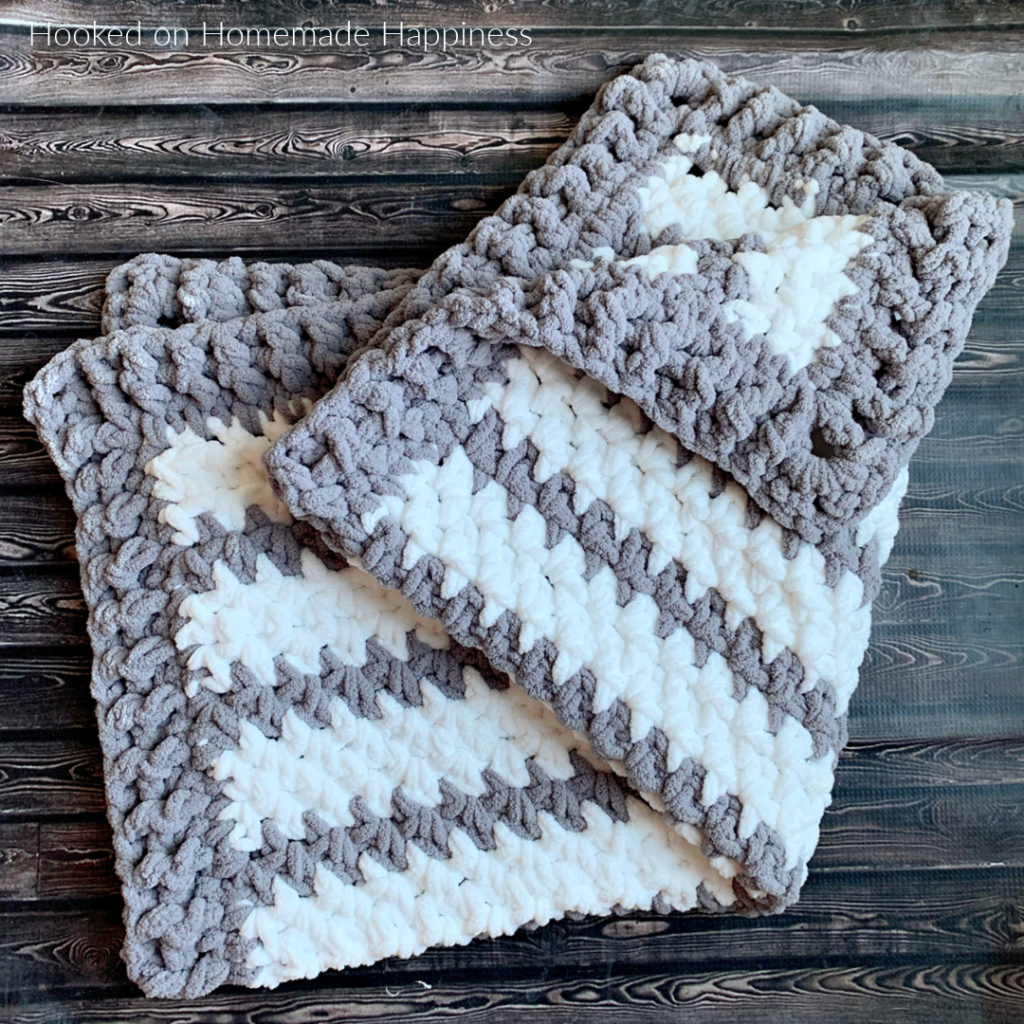 Braydon Baby Blanket Crochet Pattern - The Braydon Baby Blanket Crochet Pattern is an easy & quick baby blanket. Because of the super bulky yarn and the 1 row repeat, I was able to make it in just a day!