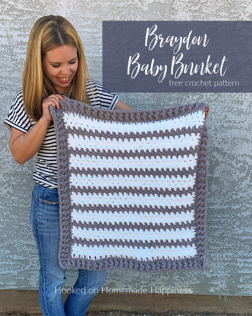 Braydon Baby Blanket Crochet Pattern - The Braydon Baby Blanket Crochet Pattern is an easy & quick baby blanket. Because of the super bulky yarn and the 1 row repeat, I was able to make it in just a day! 