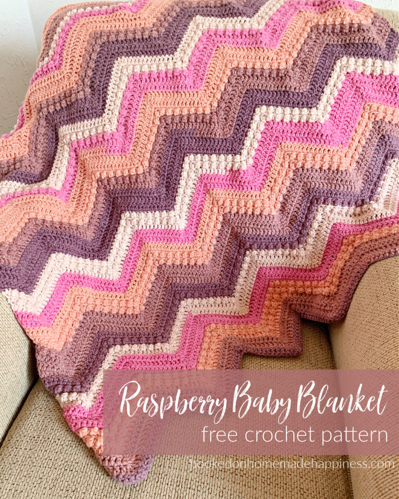 Raspberry Baby Blanket Crochet Pattern - The Raspberry Baby Blanket Crochet Pattern has a classic chevron stripe pattern with some fun berry stitches mixed in!