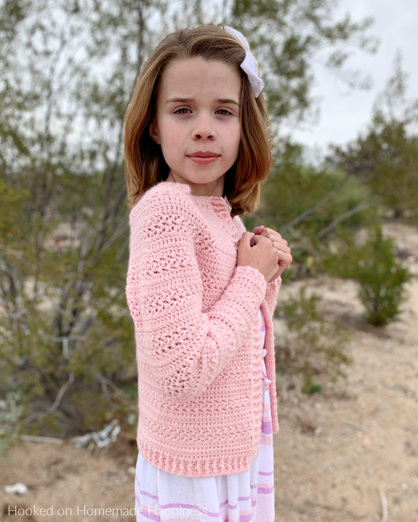 Sweet Pea Cardigan Crochet Pattern - This adorable Sweet Pea Cardigan Crochet Pattern uses two of my favorite stitches, extended single crochet and the Elizabeth stitch!