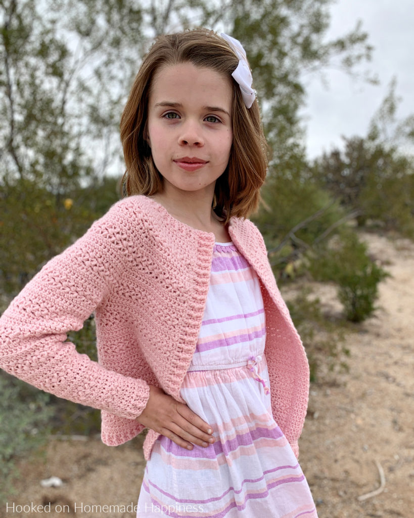 Sweet Pea Cardigan Crochet Pattern - This adorable Sweet Pea Cardigan Crochet Pattern uses two of my favorite stitches, extended single crochet and the Elizabeth stitch!