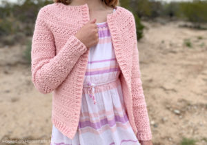 Sweet Pea Cardigan Crochet Pattern - This adorable Sweet Pea Cardigan Crochet Pattern uses two of my favorite stitches, extended single crochet and the Elizabeth stitch!