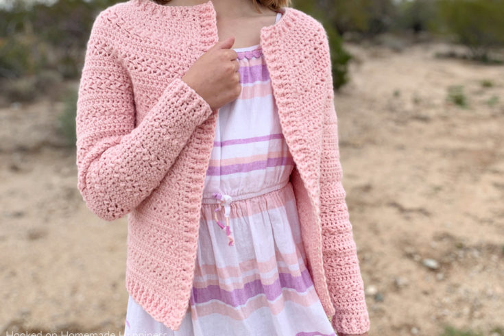 Sweet Pea Cardigan Crochet Pattern - This adorable Sweet Pea Cardigan Crochet Pattern uses two of my favorite stitches, extended single crochet and the Elizabeth stitch!