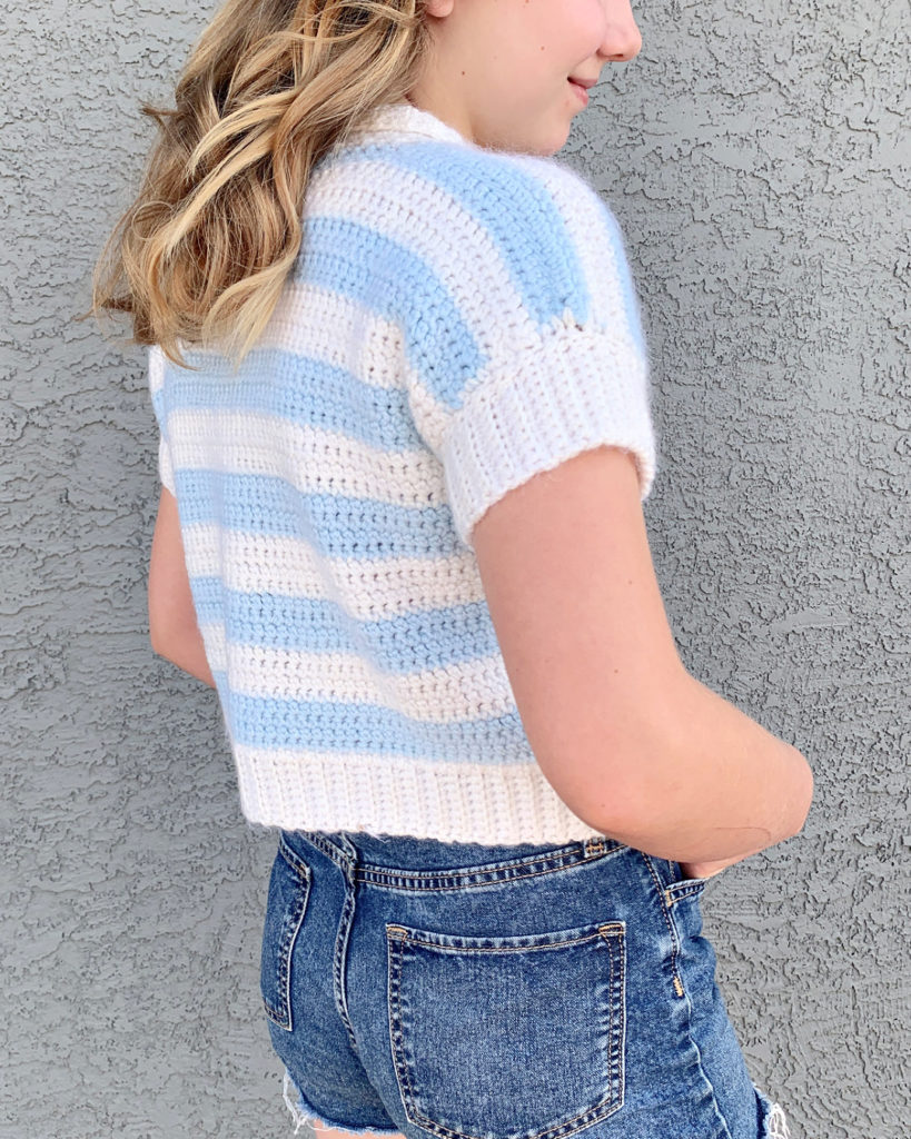 Kid's Collar Tee Crochet Pattern - The Collar Tee Crochet Pattern is a fun & stylish tee that's perfect for spring! It's made with 2 panels sewn together and then the collar & sleeve details are added. Such a fun project!