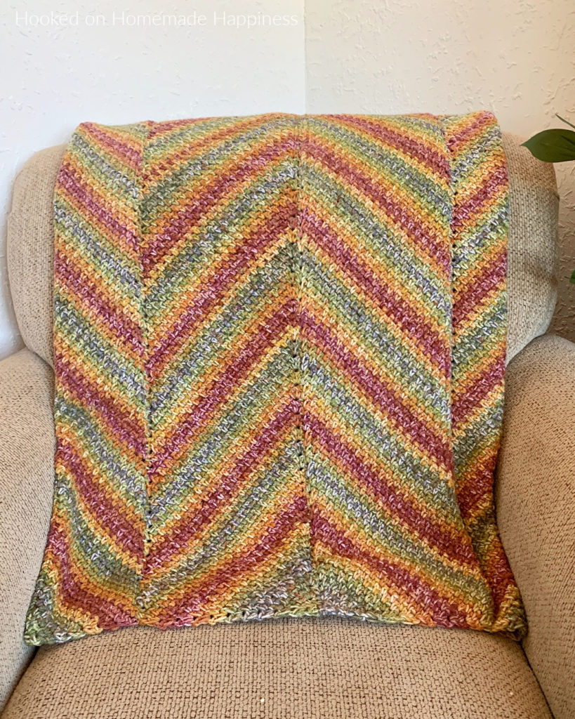 Horizon Blanket Crochet Pattern - is blanket is worked in long panels that are sewn together to create this chevron or zig-zag look.