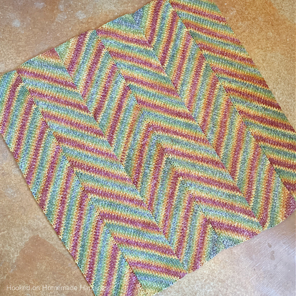 Horizon Blanket Crochet Pattern - is blanket is worked in long panels that are sewn together to create this chevron or zig-zag look.