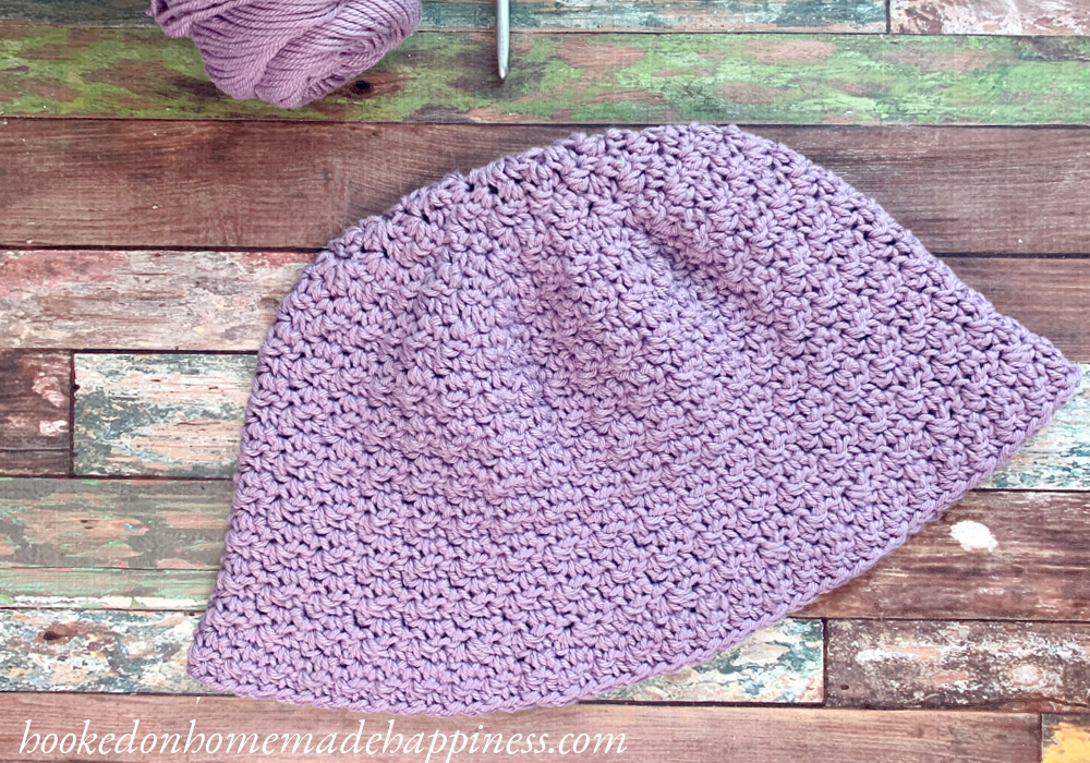 Brunch Bucket Hat Crochet Pattern - The Brunch Bucket Hat Crochet Pattern has a simple textured look with s subtle flared brim. This combined with cotton yarn makes it perfect for summer days. The long brim also makes this hat great for donation to your local cancer center.