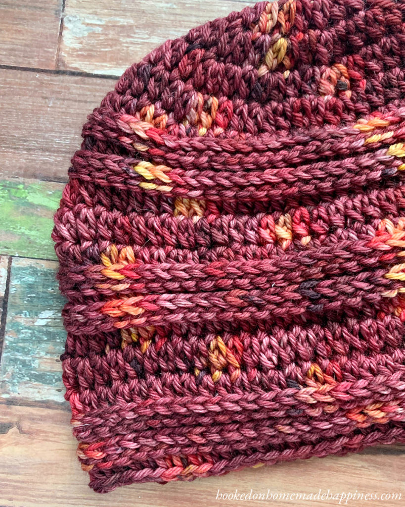 Garnet Beanie Crochet Pattern - The Garnet Beanie Crochet Pattern uses a variation of half double crochet and slip stitches to create this stretchy, textured, and knit-like ribbing.