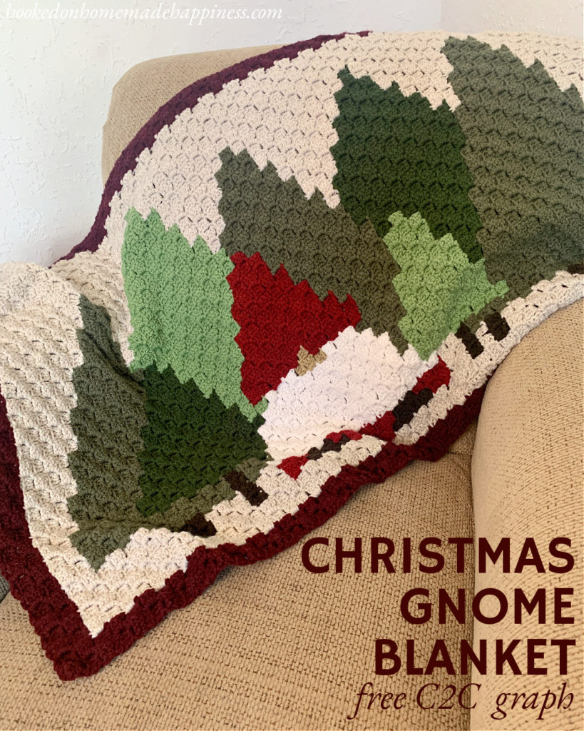 This Christmas Gnome Blanket C2C Crochet Pattern is so fun to work up! It's a small lapghan that's perfect for hanging over the back of a sofa. 