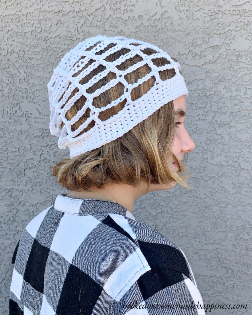 This Glow-in-the-Dark Spiderweb Hat Crochet Pattern is so fun! It's made up of mostly chain stitches so it works up very quickly. It's perfect for a fun Halloween accessory!