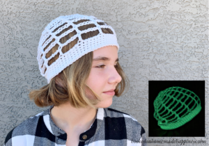 This Glow-in-the-Dark Spiderweb Hat Crochet Pattern is so fun! It's made up of mostly chain stitches so it works up very quickly. It's perfect for a fun Halloween accessory!