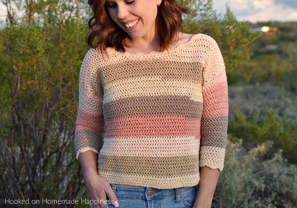 Driftwood Top Crochet Pattern - The Driftwood Top Crochet Pattern uses a variation of a half double crochet to create a tightly woven fabric. The scallops along the sleeves and neckline add a fun, feminine touch!