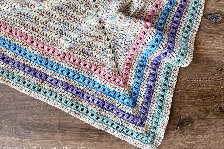 The Spring Shawl Crochet Pattern - I was inspired by our gorgeous weather and pretty pastels to make this Spring Shawl Crochet Pattern. It can be worn over the shoulders like a shawl, or wrapped up like a triangle scarf.