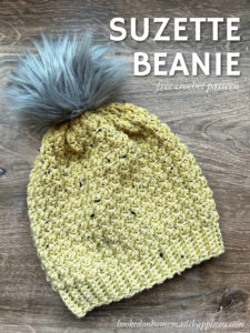 The Suzette Beanie Crochet Pattern is made as one whole rectangle and then sewn into a beanie shape!