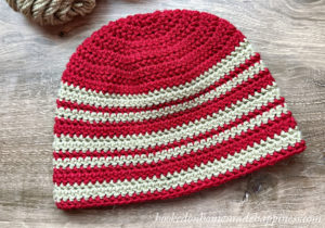 Tailgate Beanie Crochet Pattern - The Tailgate Beanie Crochet Pattern uses a tightly woven stitch called Herringbone Half Double Crochet. It creates a thick and solid piece of fabric. You can easily customize this beanie to show off your favorite team!