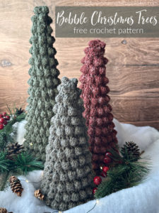 The Bobble Christmas Trees Crochet Pattern comes in 3 sizes and they all easily fit over a styrofoam cone! They are so festive, fun, and perfect for a snowy scene.
