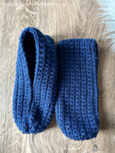 The Rectangle Slippers Crochet Pattern are really made from a simple rectangle! If you can crochet a rectangle, using all single crochet stitches, then you can make these comfy slippers. They would make a great stocking stuffer or secret Santa gift.